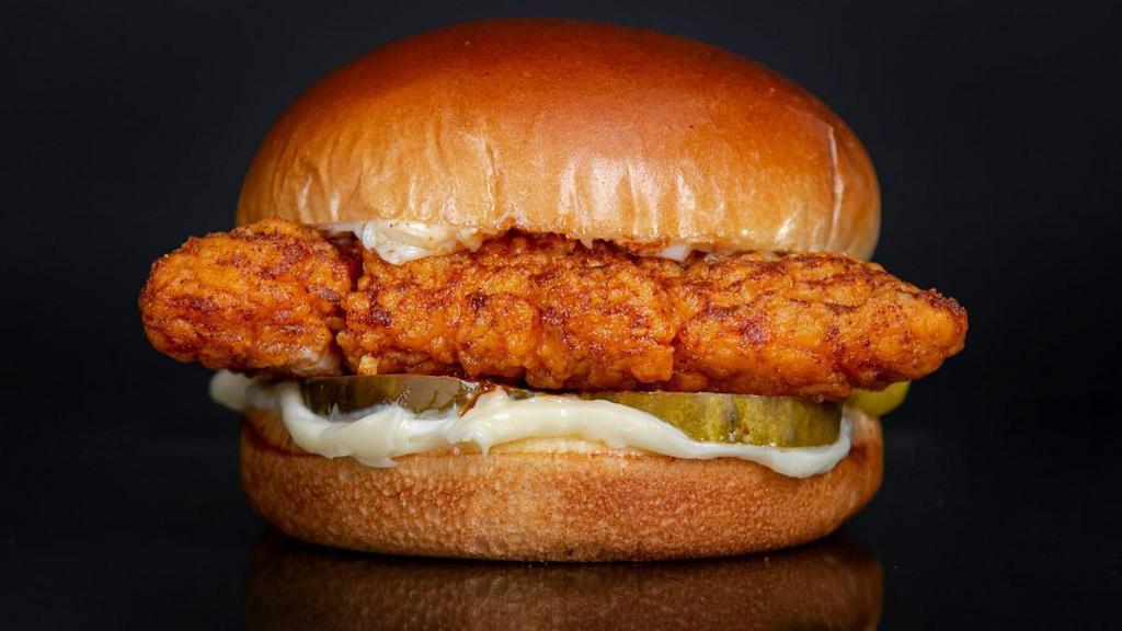 The Nashville Hot Sandwich · Southern fried and hand breaded chicken breast seasoned in our signature Sam's New Orleans style spice, dipped in chili oil, in between a toasted brioche bun with pickles, and mayo.