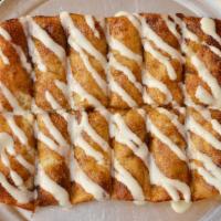 Cinnamon Sticks · Bread topped with cinnamon sugar & icing