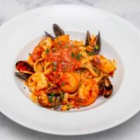 Fettuccine Ai Frutti Di Mare · fettuccine pasta, clams, shrimp, mussels, sea scallops, spicy tomato sauce, basil.