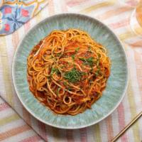 Spaghetti Pomodoro · al dente spaghetti in our homemade fresh tomato, basil + olive oil sauce.