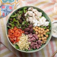 Signature Chop Salad · organic mixed greens, tomatoes, mozzarela, provolone, grilled chicken, salami, chickpeas, ol...