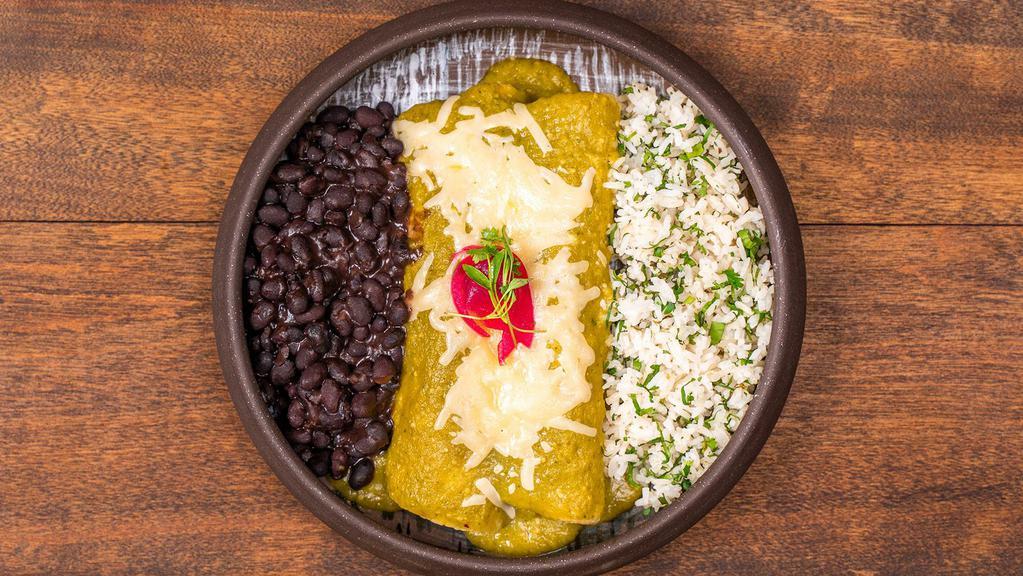Chef’S Enchiladas · Oaxacan queso, soft house-made corn tortillas served w/ black beans & cilantro lime rice.