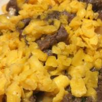 Small Carne Asada Fries  · small 
french fries topped with carne asada and cheddar cheese ( onions optional)