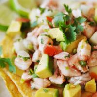 Ceviche · Shrimp, Crab meat, onion, cucumber, cilantro, and lime juice.
Served with 3 tostadas