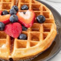 Waffles · Freshly done waffles
Topping: Fresh cut fruits and Hershey's syrup