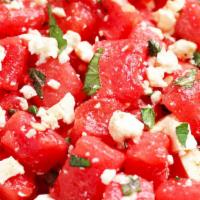 Watermelon Salad · Watermelon, jicama, peppermint leaves and Lechera