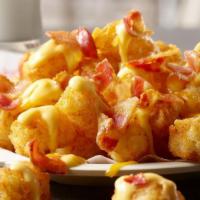 Tots · Grated and deep fried, these tots are tot-ally crispy on the outside with tender insides. Or...