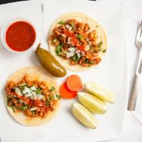 Tacos · Your choice of meat, cilantro, onion, salsa.