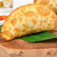 Margherita Brazilian Empanada · Fried empanadas made with an authentic Brazilian dough filled with mozzarella cheeses, tomat...