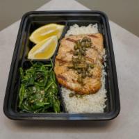 Grilled Salmon With Caper Sauce · Served with white rice and sauteed garlic spinach.