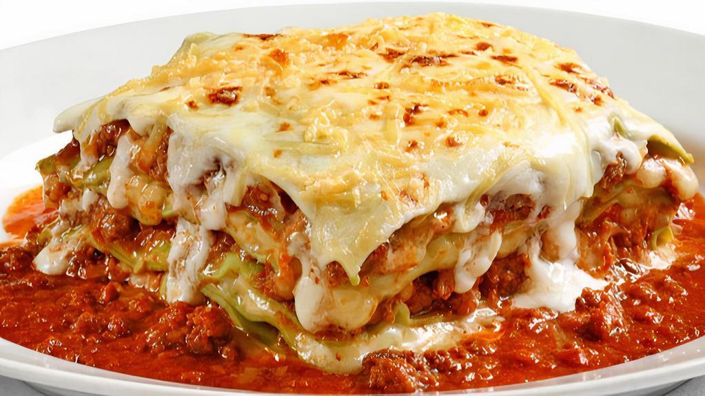 Meat Lasagna · Ground lean beef and ricotta cheese topped with our marinara sauce and melted mozzarella.