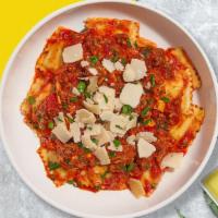 Rockin Ravioli (Meat) · Juicy meat ravioli pasta cooked in your choice of sauce and topped with black pepper, parsle...