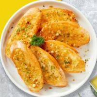 Cheesenasium Bread · Toasted bread baked with garlic butter, mozzarella, and parsley.