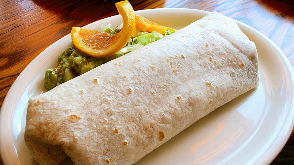 Fresco Burrito · Your choice of meat, rice, guacamole, low-fat cheese, pico de gallo, lettuce and tomatillo salsa.