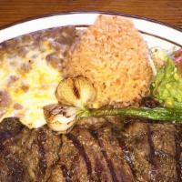 Carne Asada · Tender sliced USDA steak grilled in the authentic Mexican style.