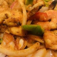 Shrimp Tandoori · Jumbo shrimp delicately marinated in special garlic, served with mint sauce.