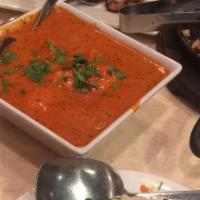 Chicken Tikka Masala · Charcoal roasted chicken cubes in moderate sauce.
