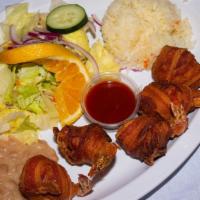 Camaron Costa Azul Combo · Includes (5) Jumbo shrimp stuffed with cheese, crab and Wrapped in bacon, white rice & beans.