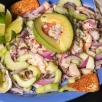 Botana Mixta · Shrimp, octopus and abalone marinated with lime juice.
Camarones, pulpo y abulón marinados c...