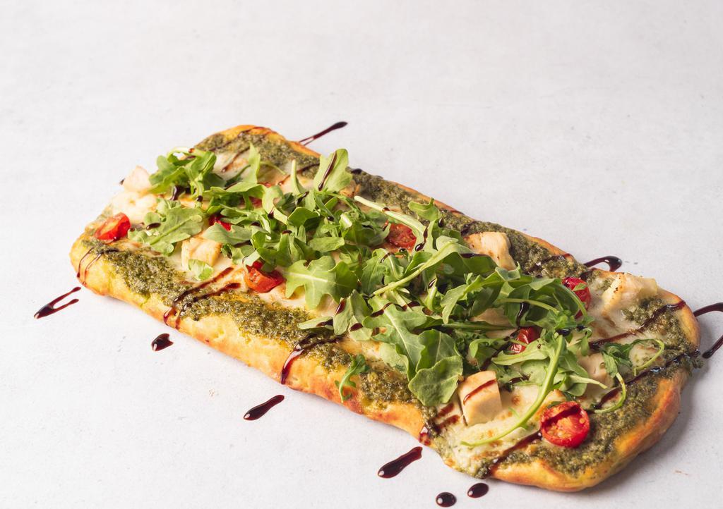 Pesto Chicken Flatbread · Grilled chicken, pesto, cherry tomatoes, and
mozzarella cheese. Topped with arugula and
drizzled with a balsamic glaze.