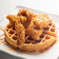 Fried Chicken And Waffle · Waffle topped with fried chicken and honey habanero sauce. Garnished with green onions