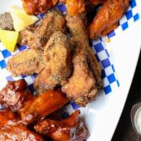 Really Big Chicken Wings (Full Dozen) · Gluten FREE, Hot Buffalo, Garlic Parmesan,BBQ, Lemon Pepper, Maple Sriracha