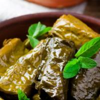 Vegan Dolma Grape Leaves  · Rice, Parsley, Tomato, and Olive Oil.