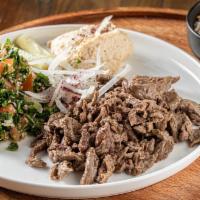 Beef Shawarma Entrée  · Thinly sliced Top Sirloin marinated for 4 days - cooked a-la-minute served with, Hummus or B...