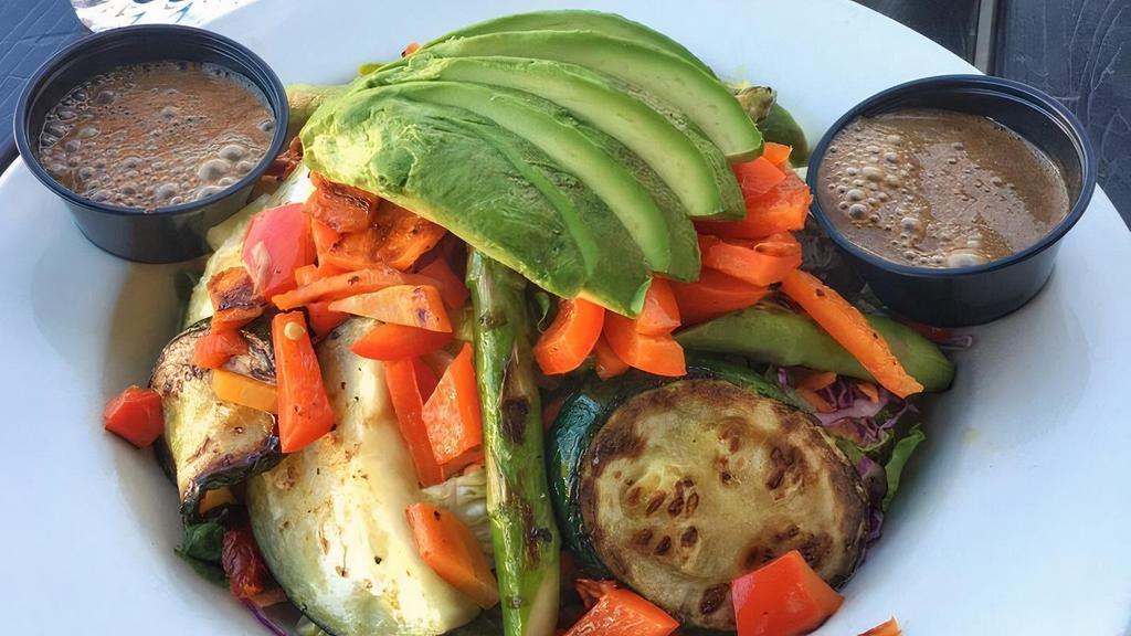 Grilled Vegetable Salad · Grilled asparagus, eggplant, zucchini, roasted bell peppers, carrots, green onions, corn, romaine 
lettuce, avocado, and sundried tomatoes. Served with dijon vinaigrette or balsamic vinaigrette 
dressing.