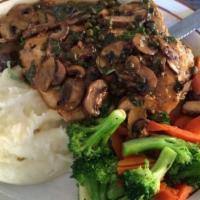 Chicken Piccata · Sautéed chicken breast with capers, mushrooms and brown gravy. Served with sautéed vegetable...