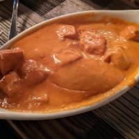 Chicken Madras Curry · Spicy chicken in a curry sauce.