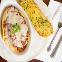 Homemade Meat Lasagna · With meat sauce and cheese.
