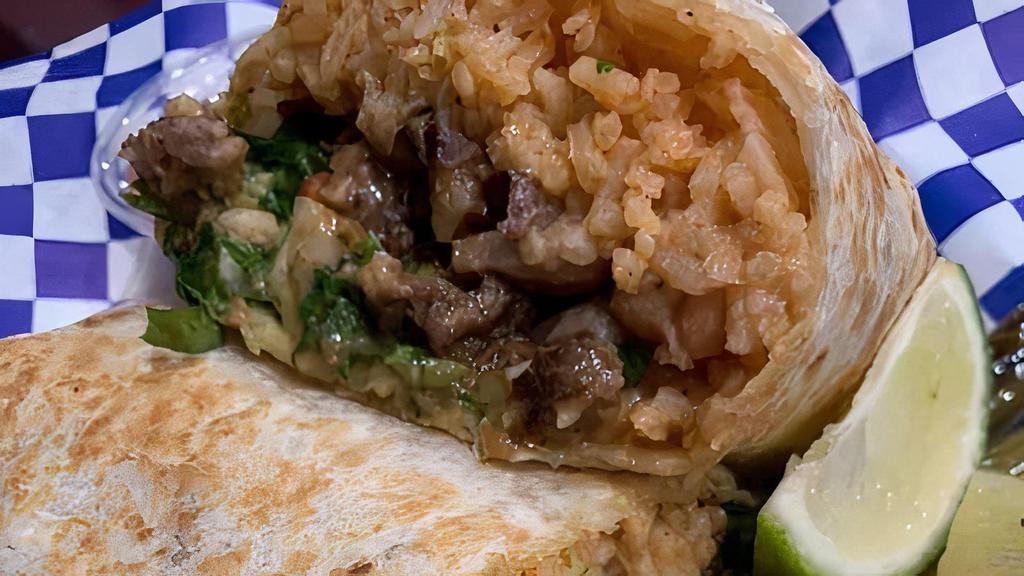 Burrito · Carne de su gusto, frijol, arroz, cilantro, cebolla, y salsa.