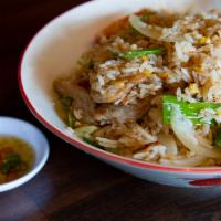 Spicy Thai Fried Rice · Spicy Jasmine rice with fresh garlic, egg, onion, and fish sauce!