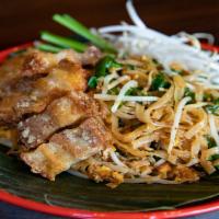 Spicy Pad Thai · Spicy. Rice noodles stir-fried with egg, bean sprouts, chives, dried shrimp, small tofu and ...