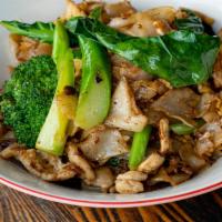 Spicy Pad Zee Ew · Spicy. Broad rice noodles stir-fried with egg, Chinese broccoli, salted soybean paste, light...