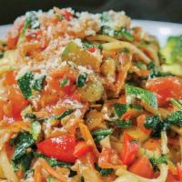 Pasta Primavera · Broccoli, zucchini, carrot, tomato, red bell pepper, garlic, spinach, served over buttery li...