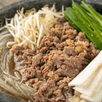 Dolpan Beef Bulgogi Soup · Beef bulgogi soup with vegetables. Served with choice of rice, glass noodles, and assorted s...