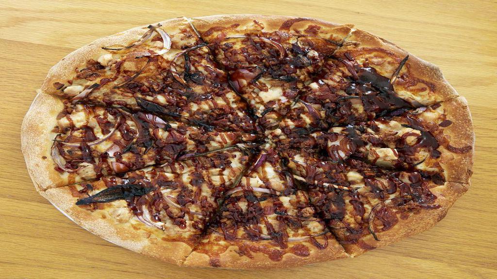 Bbq Chicken Pizza · No sauce. Red onions, diced chicken, bacon bits, BBQ sauce.