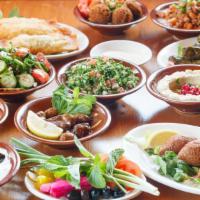 Meze  (For 6) · Hummus, mutabal, tabbouleh, labneh, falafel, grape leaves, cheese fatayer, fattoush, ful, fr...