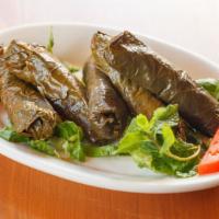 Warak-Inab-Bzeyt (Grape Leaves) · Grape leaves stuffed with rice and chopped vegetables.