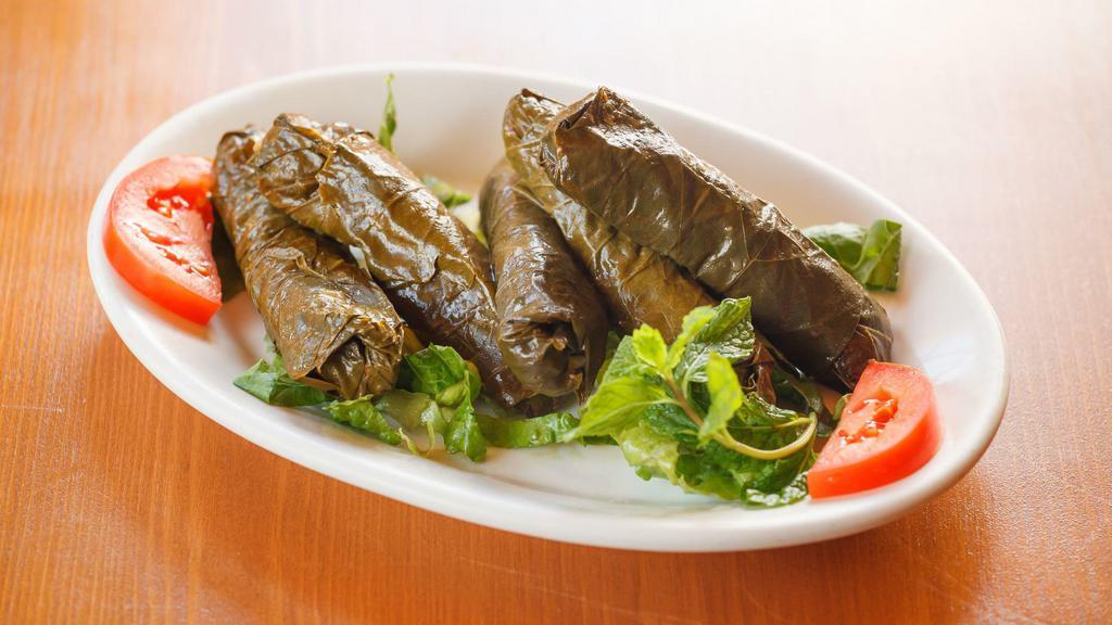 Warak-Inab-Bzeyt (Grape Leaves) · Grape leaves stuffed with rice and chopped vegetables.