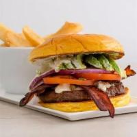 Black And Blue Burger · Applewood bacon, blue cheese crumble, avocado, tomato, and red onion with blue cheese dressi...
