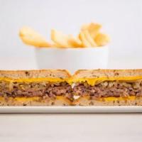 Patty Melt Burger · Grilled onions and American cheese on rye bread.