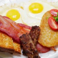 Breakfast Special · 2 scrambled eggs, choice of bacon, sausage, or ham with hash browns and toast
