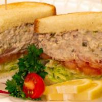 Tuna Salad Sandwich · Fresh tuna salad, with lettuce and tomato