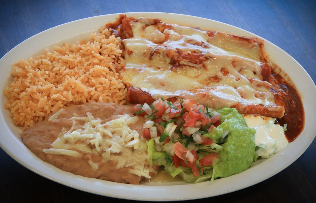 Plato De Enchiladas · Your choice of cheese, beef, or chicken. Served with refried beans, rice,and salad.