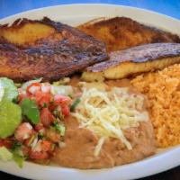 Filete De Pescado · Served with refried beans, rice, salad, and tortillas