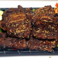 Bbq Short-Rib Beef ( Korean Galbi) · Grilled bone-in short rib beef, seasoned with soy based sauce and lemon grass.

 Served with...