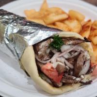 #27 Beef Shawarma Wrap · Hummus, Lettuce, Tomato, Onion and Tahini(white sauce)